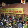 Tổ chức phát lương tại lễ hội đền Trần Thương, 2011. (Nguồn: TTXVN)