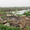 Khu chòi canh đầm của gia đình nhà ông Đoàn Văn Vươn bị phá hủy. (Nguồn: Chinhphu.vn)