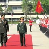 Thượng tướng Đỗ Bá Tỵ duyệt đội danh dự Quân đội Hoàng gia Thái Lan. (Ảnh: Ngọc Tiến/Vietnam+)