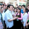 Chủ tịch nước Trương Tấn Sang với các thầy,cô và sinh viên Trường đại học Tây Bắc. (Ảnh: Nguyễn Khang/TTXVN)