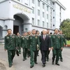 Tổng Bí thư Nguyễn Phú Trọng, Bí thư Quân ủy Trung ương thăm và làm việc với Tổng cục II - Bộ Quốc phòng. (Ảnh: Trí Dũng/TTXVN)