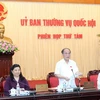 Chủ tịch Quốc hội Nguyễn Sinh Hùng chủ trì và phát biểu khai mạc Phiên họp thứ tám. (Ảnh: Nhan Sáng/TTXVN)