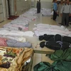 Các thi thể được tìm thấy ở Houla, Syria. (Nguồn: Reuters)