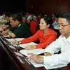 Đại biểu Quốc hội bấm nút biểu quyết thông qua các luật, nghị quyết trong phiên họp sáng 21/6. (Ảnh: Doãn Tấn/TTXVN)