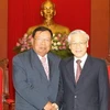 Tổng Bí thư Nguyễn Phú Trọng tiếp Thường trực Ban Bí thư, Phó Chủ tịch nước Lào Bounnhang Vorachith. (Ảnh: Trí Dũng/TTXVN)