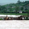 Một làng ở Triều Tiên bị ngập lụt trong một đợt mưa lớn kéo dài. (Nguồn: KCNA)