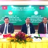 Đoàn Chủ tịch Hội nghị (từ trái sáng phải: ông Vũ Trọng Kim, ông Bu Thong và ông Min Khin. (Ảnh: Hoàng Tuấn Thanh/Vietnam+) 