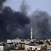 Khói đen bốc lên từ một điểm giao tranh ở Aleppo. (Nguồn: Reuters)