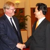 Thủ tướng Nguyễn Tấn Dũng tiếp ông David Wootton, Thị trưởng Khu tài chính London (Vương quốc Anh). (Ảnh: Đức Tám/TTXVN)