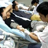 Hoạt động hiến máu tại Trung tâm truyền máu khu vực Hà Nội. Ảnh minh họa. (Ảnh: Hữu Oai/TTXVN)