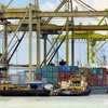 Hoạt động xuất-nhập khẩu hàng hóa ở Georgetown gần Penang, bán đảo phía Bắc Malaysia. (Nguồn: AFP)