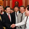 Chủ tịch nước Trương Tấn Sang gặp gỡ đại diện các doanh nhân tiêu biểu trong cả nước. (Ảnh: Nguyễn Khang/TTXVN)