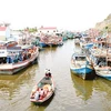 Tàu cá neo đậu dày đặc trên cửa sông Ba Hòn huyện Kiên Lương tỉnh Kiên Giang. (Nguồn: SGGP)