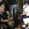 Hai đối tượng Nguyễn Thị Minh và Sùng Seo Páo bị bắt giữ. (Nguồn: báo Lào Cai)