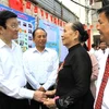 Chủ tịch nước Trương Tấn Sang đến dự "Ngày hội đại đoàn kết toàn dân tộc" tại khu phố 3, phường 5, quận 3 (Thành phố Hồ Chí Minh). (Ảnh: Thanh Vũ/TTXVN)