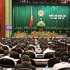Quốc hội biểu quyết thông qua Luật xuất bản (sửa đổi). (Ảnh: Nguyễn Dân/TTXVN)