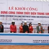 Phó Thủ tướng Chính phủ Hoàng Trung Hải cùng các đại biểu phát lệnh khởi công dự án Thủy điện Trung Sơn. (Ảnh: Ngọc Hà/TTXVN)