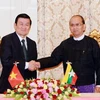 Tổng thống Myanmar Thein Sein và Chủ tịch nước Trương Tấn Sang tại lễ ký các văn kiện giữa hai nước. (Ảnh: Nguyễn Khang/TTXVN)