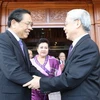 Tổng Bí thư, Chủ tịch nước Lào Choummaly Sayasone và Tổng Bí thư Nguyễn Phú Trọng trong chuyến thăm Lào của Tổng Bí thư tháng 6/2011. (Ảnh: Trí Dũng/TTXVN)