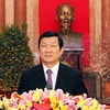 Chủ tịch nước Trương Tấn Sang chúc Tết đồng bào, đồng chí, chiến sỹ cả nước và đồng bào ta ở nước ngoài. (Ảnh: Nguyễn Khang/TTXVN)