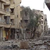 Cảnh hoang tàn, đổ nát do xung đột giữa quân Chính phủ Syria và quân nổi dậy. (Nguồn: Reuters)