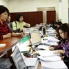 Hoạt động thu, chi ngân sách ở Kho bạc Nhà nước thành phố Hà Nội. (Nguồn: TTXVN)