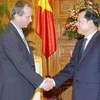 Phó Thủ tướng Vũ Văn Ninh tiếp Đoàn Tham khảo Điều IV (Điều lệ Quỹ) của IMF, do ông Alfred Schipke dẫn đầu. (Ảnh: An Đăng/TTXVN)