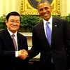 Tổng thống Hoa Kỳ Barack Obama đón Chủ tịch nước Trương Tấn Sang. (Ảnh: Nguyễn Khang/TTXVN)