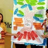 Đại diện trẻ em trình bày về "Các biện pháp phòng chống tình trạng tảo hôn và lao động trẻ em.” (Ảnh: Nguyễn Thủy/TTXVN)