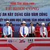 Thủ tướng Nguyễn Tấn Dũng và các đại biểu phát lệnh khởi công Dự án xây dựng cầu Vàm Cống. (Ảnh: Đức Tám/TTXVN)