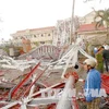 Cột thu phát sóng tại tỉnh Quảng Bình bị đổ trong cơn bão số 10. (Ảnh: Võ Thị Dung/TTXVN)
