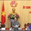 Chủ tịch Quốc hội Nguyễn Sinh Hùng chủ trì và phát biểu khai mạc Phiên họp thứ 22 của Ủy ban Thường vụ Quốc hội khóa XIII. (Ảnh: Nhan Sáng/TTXVN)