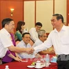 Thường trực Ban Bí thư Trung ương Đảng Lê Hồng Anh gặp gỡ các đại biểu tại buổi gặp mặt. (Ảnh: Dương Giang/TTXVN)
