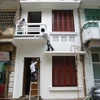 Càng gần Tết, dịch vụ dọn nhà thuê càng hút khách (Ảnh: Sơn Bách/Vietnam+)