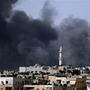 Khói bốc lên từ khu phố Salah al-Din ở trung tâm thành phố Aleppo. (Nguồn: Reuters) 