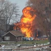 Hiện trường vụ xả súng, bên ngoài ngôi nhà bị hỏa hoạn. (Nguồn: usatoday.com)