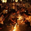 Người dân Campuchia cầu nguyện trên các con phố trước lễ hỏa táng của cựu vương Norodom Sihanouk. (Nguồn: AP)