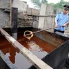 Dầu ăn bẩn bị công an Trung Quốc thu giữ. (Nguồn: AFP / Getty Images)