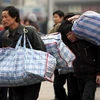 Những người nông dân Trung Quốc rời quê ra thành thị kiếm việc làm. Ảnh minh họa. (Nguồn: shardsofchina)