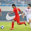 Đội U23 Việt Nam (đỏ) trong trận gặp đội U23 Trung Quốc. (Ảnh:Ngọc Trường/TTXVN)