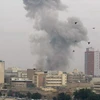 Khói bốc lên sau vụ nổ tại Baghdad ngày 8/12. (Ảnh: AFP/ TTXVN) 