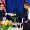 Tổng thống Nga Dmitry Medvedev và Tổng thống Mỹ Barack Obama tại Copenhagen. (Ảnh: AFP/TTXVN) 