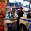 Cảnh sát tuần tra trên Quảng trường Thời đại. (Ảnh: AFP/TTXVN) 