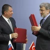 Bộ trưởng Năng lượng Thổ Nhĩ Kỳ Taner Yildiz và Phó Thủ tướng Nga Igor Sechin (trái). (Ảnh: Reuters)
