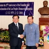 Phó Thủ tướng Lào Somsavad Lengsavath và ông Phạm Quang Nghị. (Ảnh: Phạm Kiên/TTXVN)