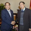 Phó Thủ tướng Phạm Gia Khiêm tiếp Bộ trưởng Bộ Lễ nghi-Tôn giáo Campuchia Min-Khin. (Ảnh: Thái Bình/TTXVN)