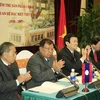 Các đại biểu tại hội nghị nghiệm thu sản phẩm chính lịch sử quan hệ đặc biệt Việt Nam-Lào. (Ảnh: Thống Nhất/TTXVN)