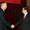Chủ tịch nước Nguyễn Minh Triết tiếp Giám đốc Tài chính Tập đoàn Shell Simon Henry. (Ảnh: Nguyễn Khang/TTXVN)