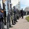 Cảnh sát chống bạo động triển khai để đối phó với các cuộc biểu tình ở thủ đô Alger. (Ảnh:THX/TTXVN)