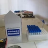 Những hộp mẫu bệnh phẩm tại Bệnh viện đa khoa huyện Hoài Đức. (Ảnh: PV/Vietnam+)